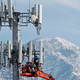 A contract crew for Verizon, works on a cell tower to update it to handle the new 5G network in Orem, Utah on December 10, 2019.